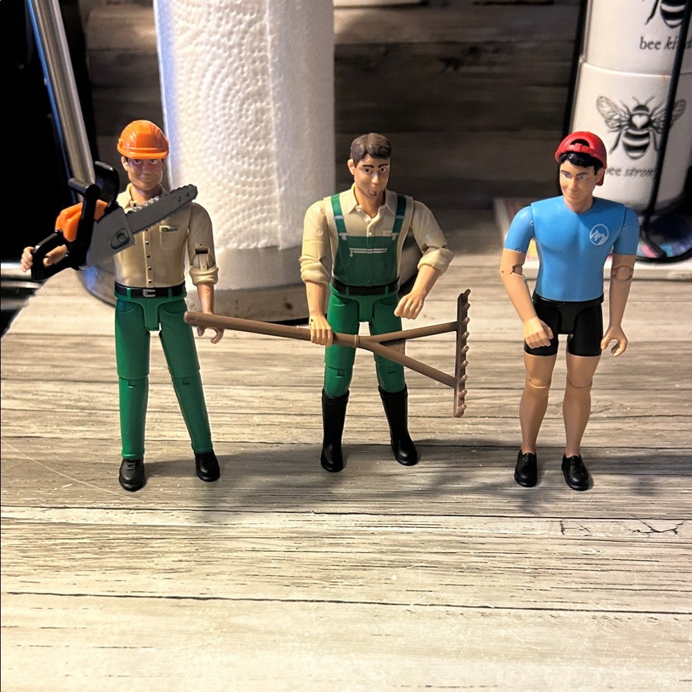 Set of Three Worker Action Figures